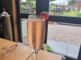 Enjoying a prosecco in the bar