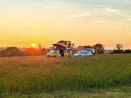 Sunset campers at the wild meadow