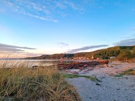 Looking along the beech towards the site