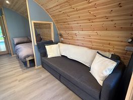 Sofa bed, double bed and bunks behind.