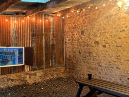 The barn, with window to allow the group to see the cows being milked.