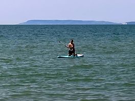 Spot of paddle boarding in the sea