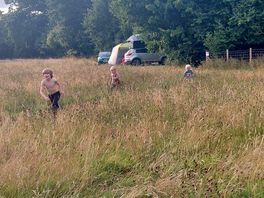 Children love running through the ling grass