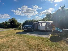 Pitch 26 - it’s large enough for a campervan & awning. has water & electric hookup