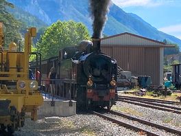 Steam train leaving the station