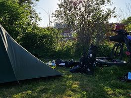 Bikepacking tent and our two bikes :)