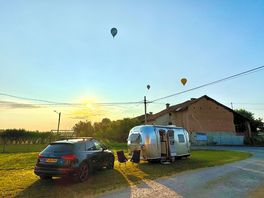 Sunrise hot air balloons above us