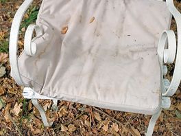 Random chair with dirty cushion on our pitch