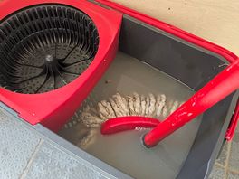 Filthy mop and bucket.