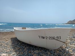 In the old fishing village ten minutes walk away.