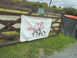 The sign.