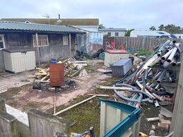 Behind the fence - needs tided and cleaning out - could harbour vermin