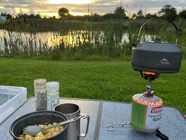 Enjoying the sunset with a view over the small fishing lake.