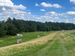 The site from the carpark. they help you with your camping equipment to the pitch!