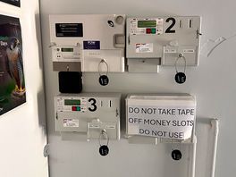 Pay machines in showers