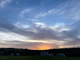 Sunset over the hill from our tent.
