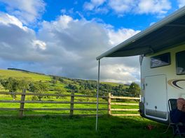 Our view from our pitch. river a short walk across meadow