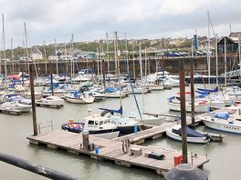 Across the marina to the site in the background