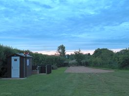 Toilet to the left by entrance gate