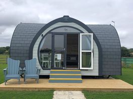 Front of Pod and decking, seating area.