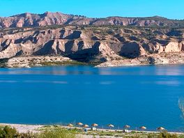 Besutiful lake with beach and fishing