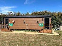Toilet/shower block