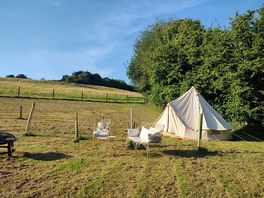 Bell tent set up on the bottom field