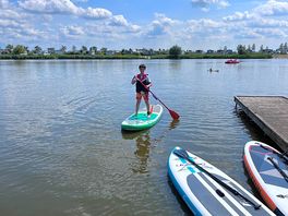 Sup boarding in the camp lake