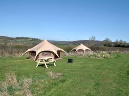 New for 2025 ready-pitched rental tent with four or five beds, electric socket with USB points