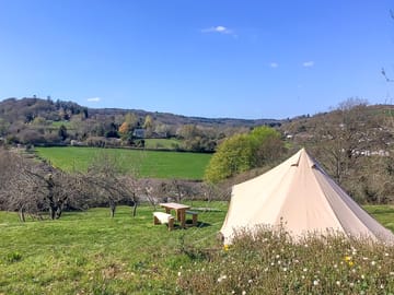 Bell tent pitch among wild flowers (added by manager 31 May 2023)