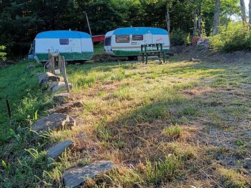 On-site touring caravan and shared facilities unit