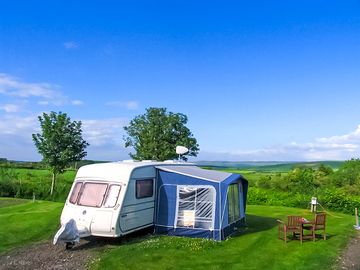 Grass pitch with Galloway views