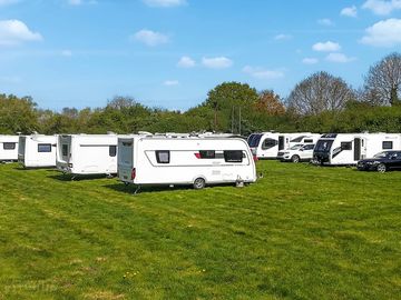 Pitches on the neatly mown field