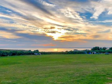 Visitor image of the sunset and seaview from the campsite (added by manager 11 Oct 2022)