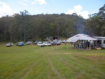 Having a few beers around the covered campfire
