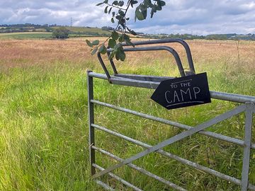 View of the camping meadow from the open barn
