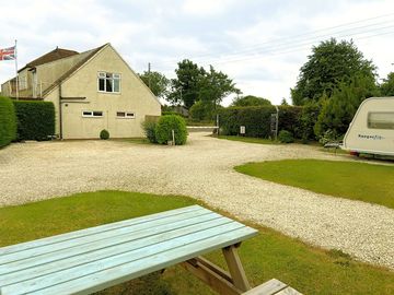 Entrance to the site and hardstanding pitches