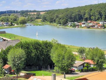 Hire a paddleboard or canoe on the lake