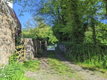 The gate to the lane which runs to the campsite
