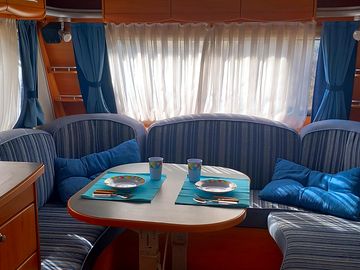 Spacious round seat for at least 4 people, also suitable for a foldable double bed