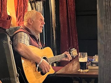 Some times the locals just pick up a guitar