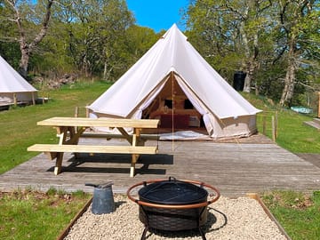 Pink bell tent with deck area