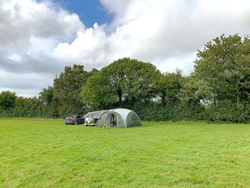 Non-electric grass tent or trailer tent pitch
