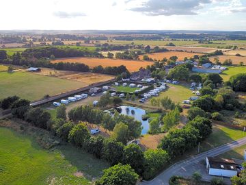 Countryside site beside a pub and railway lots of wildlife in surrounding fields