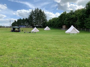 The group site includes 3 bell tents each sleeping 4 people, great for family groups
