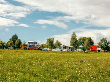 Lower part of the campsite, with a stunning view of the Alps