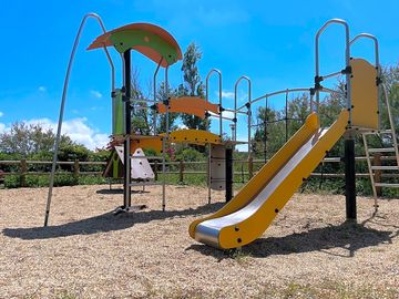Playground with slides and climbing frames