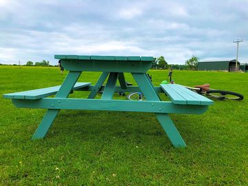 Picnic benches for outdoor meals and drinks