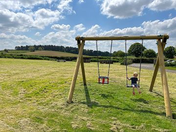Childrens play area swings