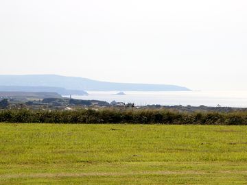 View to gwithian lighthouse and st ives beyond
